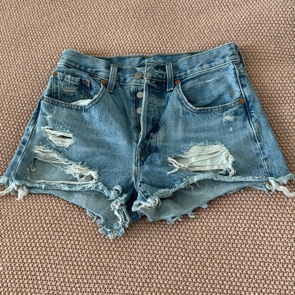 Levi’s 501 distressed high waisted shorts